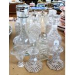 A pair of glass decanters and stoppers, height 25cm, 4 others, and various drinking glasses etc