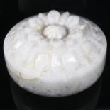 A large piece of carved rock crystal with floral design, 24cm across