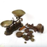A Kenrick mincer, and a pair of brass pan kitchen balance scales and weights