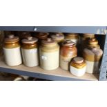 A group of stoneware kitchen storage jars
