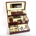 A cantilever jewellery box, with a quantity of silver and other costume jewellery, to include