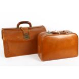 A leather Gladstone bag, and similar vanity case (2)