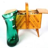 A cantilever sewing box and contents, and a green Art glass vase, height 40cm
