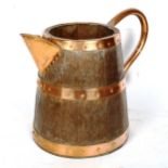 An Antique copper-bound coopered oak jug, height 30cm