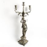 A silver plate on copper table candelabra, with figural column support, height 58cm