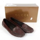 GUCCI - a pair of near-new chocolate leather soft Guccissima women's driver loafers, size 37.5, with