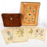Art Nouveau book prints, a crocodile handbag, and a leather notecase