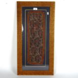 A framed embroidered paisley panel, overall 77cm x 40cm