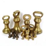 A graduated set of cast-brass bell balance scale weights, from 7lb to a quarter of an ounce