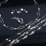 2 silver and pearl set necklaces, a bracelet, a brooch, and earrings