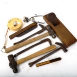 Various tools, including Japanese woodworking plane, hammer, folding saw etc