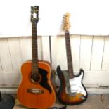 An Eko 6-string acoustic guitar, and a Cruiser by Crafter electric guitar (2)