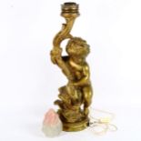 A large painted composition figural putti torch table lamp and shade, height 86cm