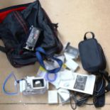 Sony HD Handycam, Lumix Panosonic waterproof marine case, and softshell carrying case