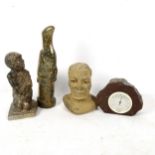 A carved stone figure of a boy, 16cm, an African head, a bird, and a Serpentine Ware thermometer