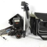 OLYMPUS - an OM2000 single lens reflex camera, with tripod hot shoe flash, and softshell case