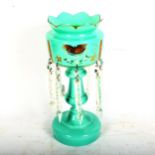 An Edwardian turquoise glass table lustre with enamelled and gilded decoration