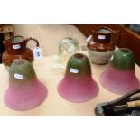 A vaseline glass lampshade, height 12cm, 3 others, and a pair of stoneware Harvest jugs