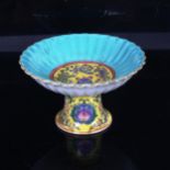 A Chinese yellow and turquoise ground porcelain stem bowl, 6 character mark on base, height 9cm,