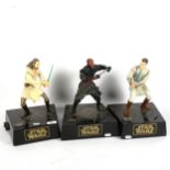 3 Star Wars figures on plinths, height 30cm