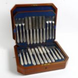 A canteen of silver plated dinner knives and forks for 18 people, with bead edge handles and