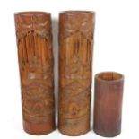 A large pair of Chinese bamboo vases, and a smaller bamboo brush pot, largest height 36cm (3)