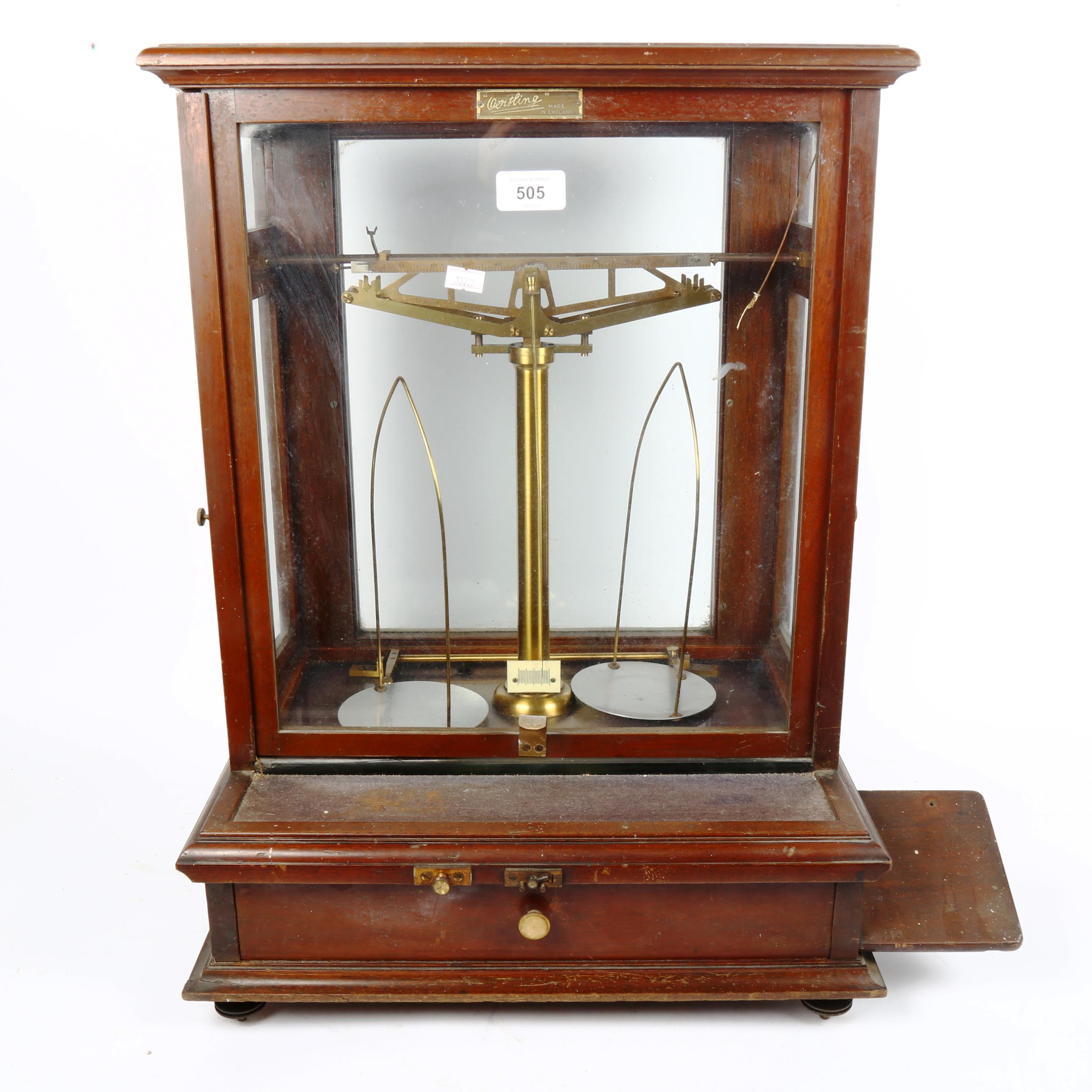 A Gertling brass balance scale, in mahogany case with drawer under containing accessories, height