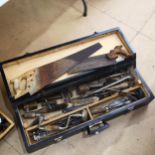 A black tool chest, containing various tools