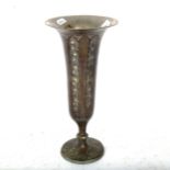A Middle Eastern metal vase with Damascene decoration, 29cm