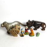 A dog nutcracker, soapstone dodo etc