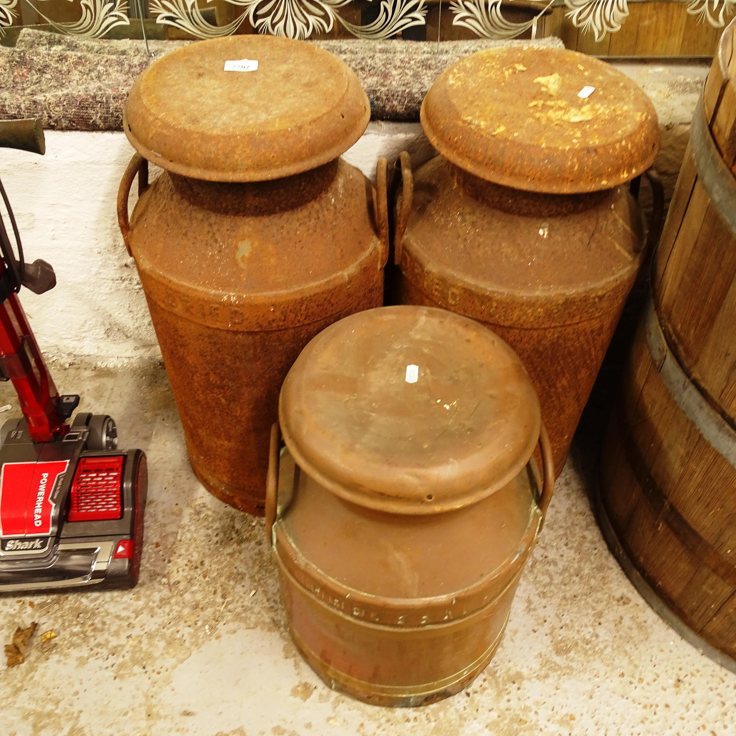 A United Dairies brass and copper-bound milk churn, and 2 other churns (3)