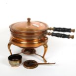 An Iranian copper Primus stove and pot with turned wood handles