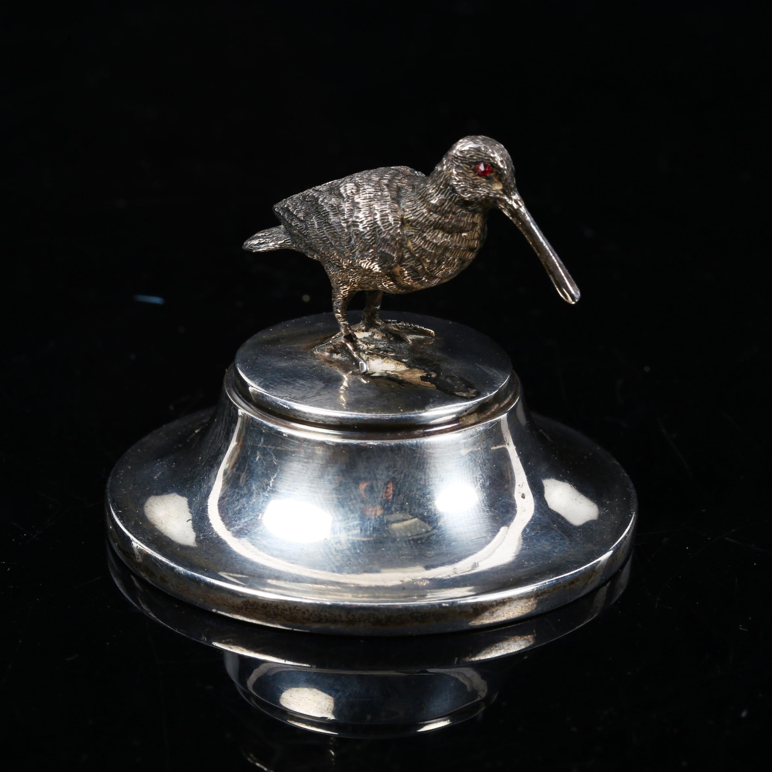 SAMPSON MORDAN & COMPANY - a silver desk stand surmounted by a curlew