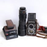 A Vintage Rolleiflex twin lens reflex camera, Sigma telephoto 400mm lens etc