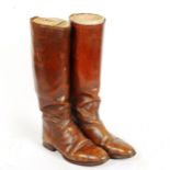 A pair of lady's tan leather horse riding boots