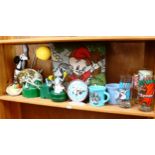 A shelf of Bugs Bunny memorabilia, including a clock and lamp