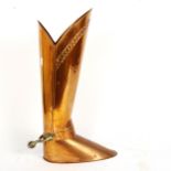 A novelty copper and brass cowboy boot stick stand, with spur, height 52cm