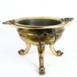 A 17th/18th century brass tripod brazier/cooking cauldron, diameter 52cm, height 36cm