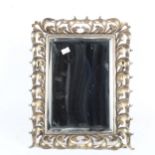 A silver plated foliate strut dressing table mirror, height 34cm