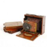 A 19th century mahogany plate camera, with Thornton-Pickard "Time" plaque, and 2 dark slides