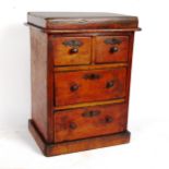 A Vintage stained pine table-top chest of drawers, height 40cm