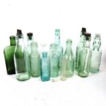 Various advertising glass bottles, including Schweppes and West Surrey Mineral Water Works