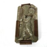 An Antique chocolate mould, depicting child holding a cornucopia, 19cm x 10cm