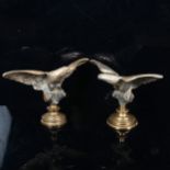 An opposing pair of cast-bronze eagle figures, wingspan 18cm