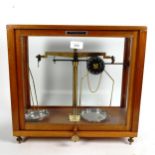 A Griffin & George Ltd cased set of laboratory balance scales, case height 40cm
