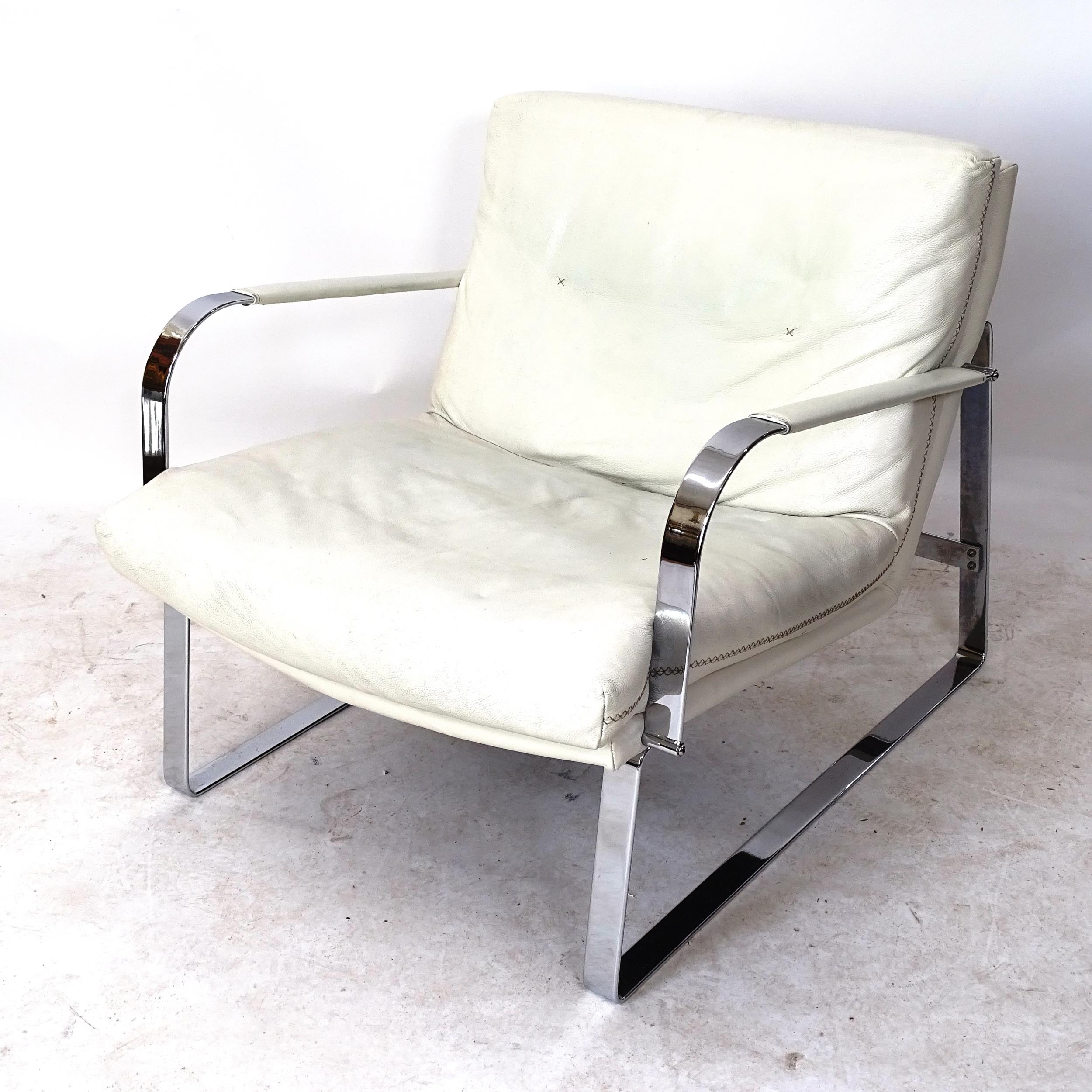 A Swedish leather and chrome lounge chair with cross stitch detail by Conform with maker?s label
