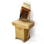 An Art Deco bow front dressing table, with cupboard under, W82cm, H150cm, D50cm