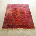 A red ground Turkey rug, 210cm x 167cm (Viewing by appointment only as this rug is not on display in
