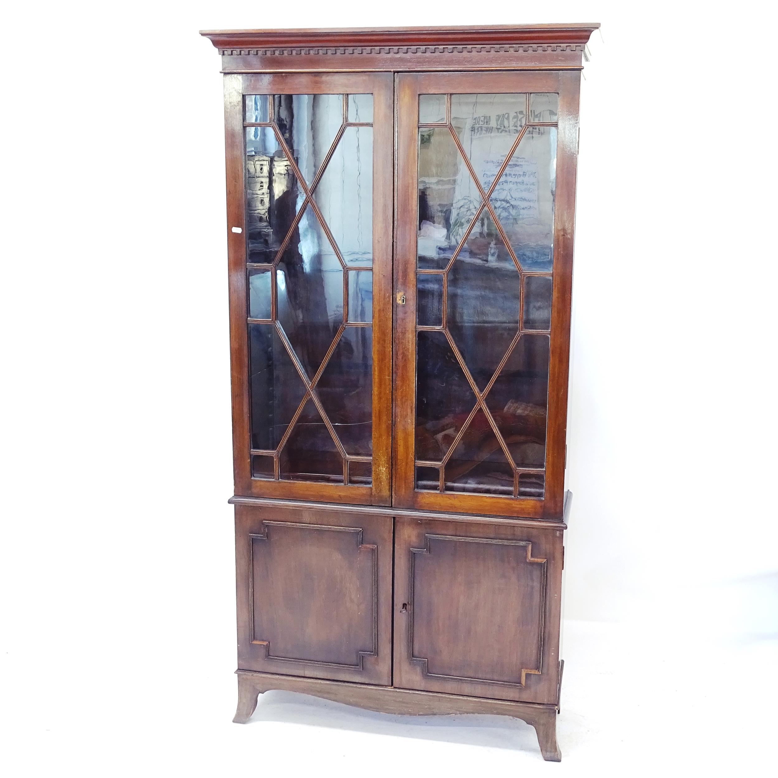 A 19th century mahogany 2-door bookcase, with 3 adjustable shelves, and cupboard under, W98cm,