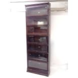 A 7-shelf Globe-Wernicke bookcase, W87cm, H252cm, D25cm (with labels)